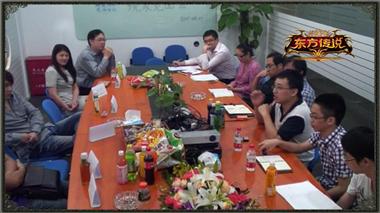 图片: 图5+研发人员与玩家们共同探讨游戏的修改方向.jpg